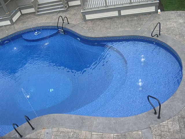 Backyard swimming pool with a Merlin vinyl liner