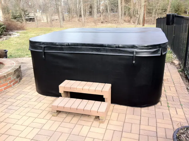 Merlin spa cover on a backyard spa